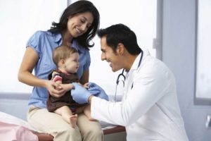 Doctor with Child Patient