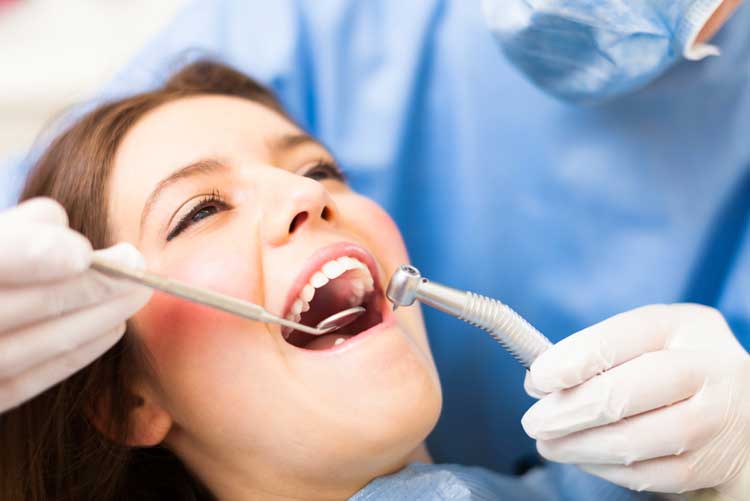 dental--dentist--oral-surgery-treatment-Fotolia_67766775_M Dentist with Patient